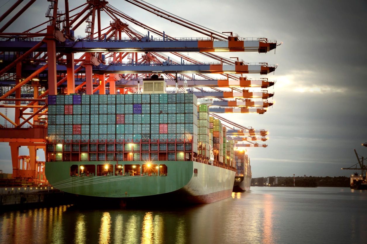 Cargo ship at port — US Cotton Exporters